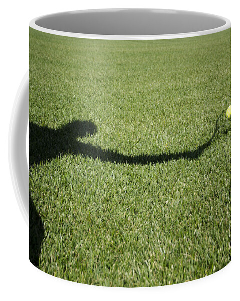 Tennis Coffee Mug featuring the photograph Shadow playing tennis by Mats Silvan