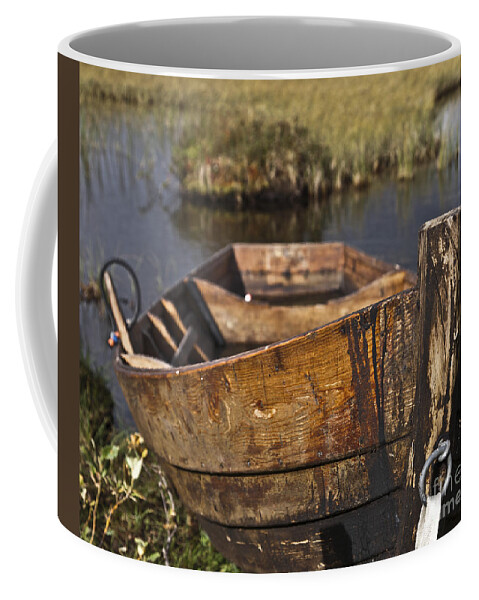 Row Boat Coffee Mug featuring the photograph Skiff in swedish swamp by Heiko Koehrer-Wagner