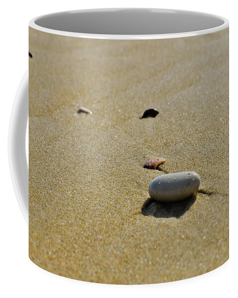 Mediterranean Coffee Mug featuring the photograph Stones in the sand by Michael Goyberg