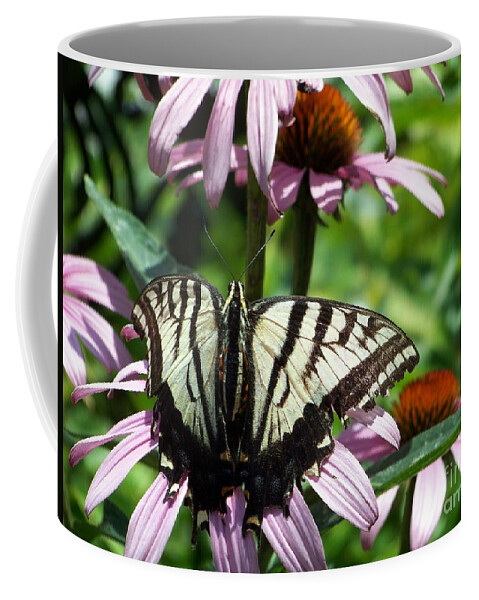 Butterflies Coffee Mug featuring the photograph The Survivor by Dorrene BrownButterfield