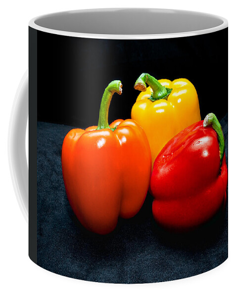 Vegetable Coffee Mug featuring the photograph The Three Peppers by Christopher Holmes