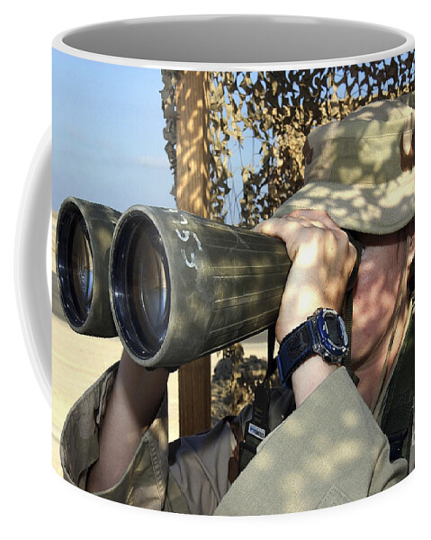 Airman Coffee Mug featuring the photograph U.s. Air Force Airman Looks by Stocktrek Images