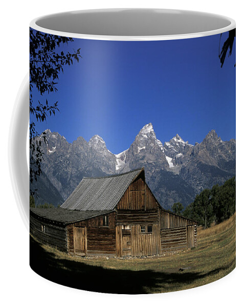 Late Snow Coffee Mug featuring the photograph South Moulton barn Grand Tetons by Gary Langley
