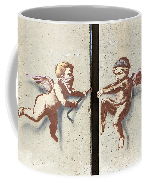 Banksy Coffee Mug featuring the photograph Almost There #1 by Munir Alawi