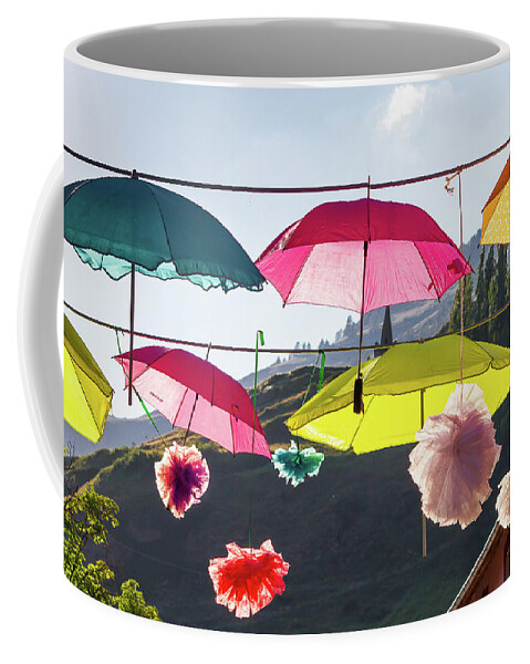 Umbrella Coffee Mug featuring the photograph Colored umbrellas # II by Paul MAURICE
