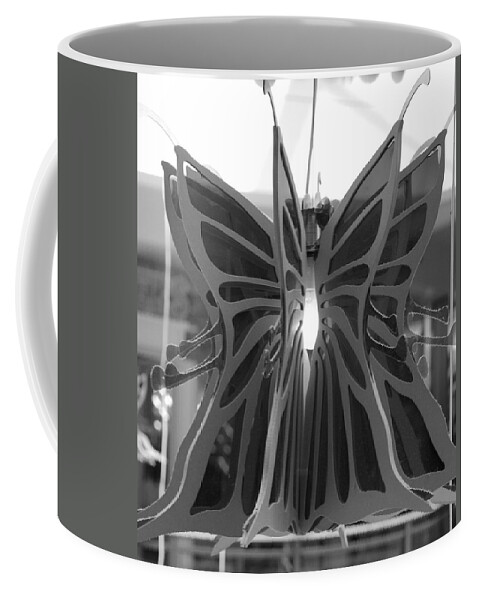 Black And White Coffee Mug featuring the photograph Hanging Butterfly #1 by Rob Hans
