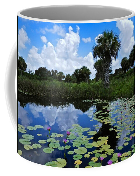 Waterlily Coffee Mug featuring the photograph Magical Water Lily Pond #1 by Joe Wyman