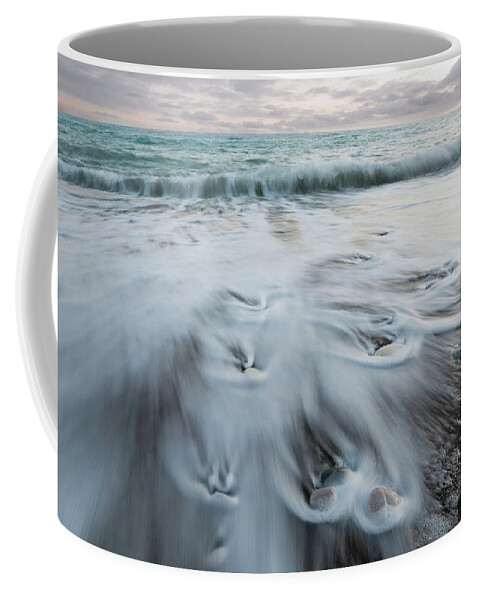 Coastline Coffee Mug featuring the photograph Pebbles in the beach and flowing sea water #6 by Michalakis Ppalis
