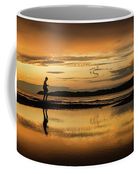 Silhouette Coffee Mug featuring the photograph Silhouette in Sunset #1 by Daliana Pacuraru