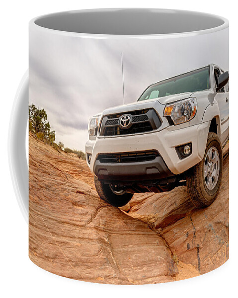 4 Wheel Drive Coffee Mug featuring the photograph Toyota Tacoma at Arches #1 by Brett Engle