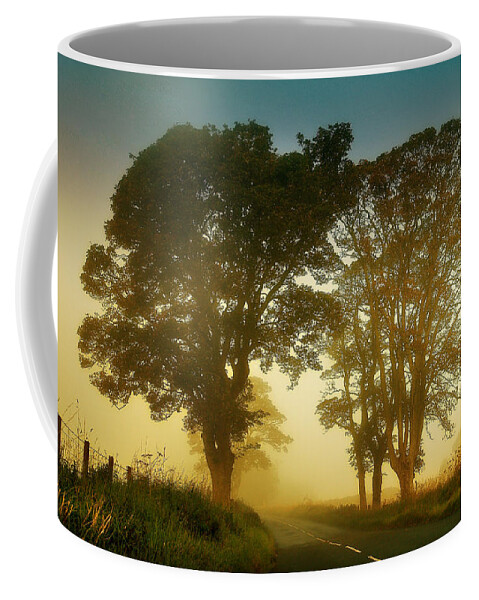 Scotland Coffee Mug featuring the photograph Twilight Guardians. Misty Roads of Scotland by Jenny Rainbow