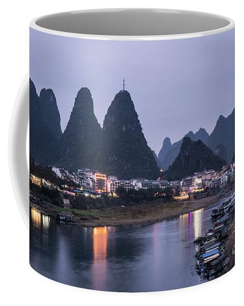 China - East Asia Coffee Mug featuring the photograph Twilight over the Lijang river in Yangshuo #1 by Didier Marti