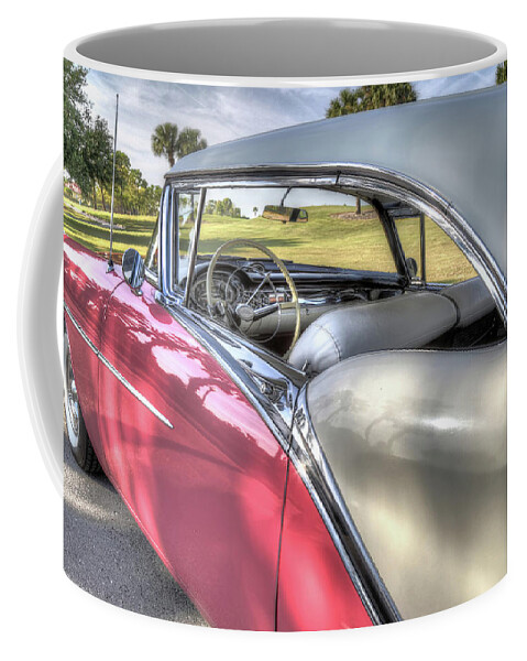 57 Oldsmobile Coffee Mug featuring the photograph 1957 Oldsmobile by Donna Kennedy