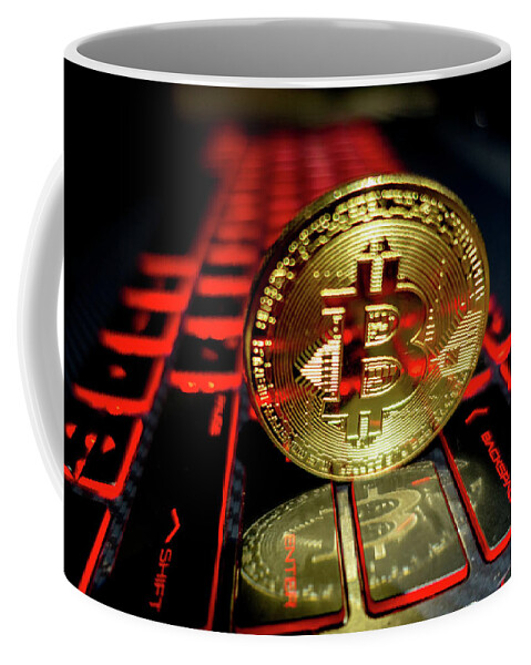 Keyboard Coffee Mug featuring the photograph Bitcoin coin l on laptop keyboard #2 by Alex Grichenko