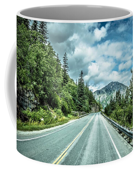 Road Coffee Mug featuring the photograph The White Pass and Yukon Route on train passing through vast lan #34 by Alex Grichenko