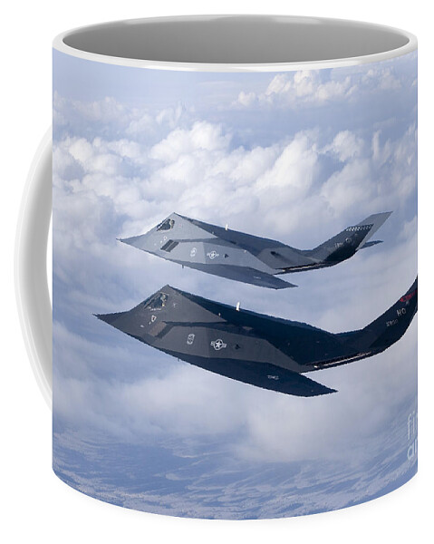 Color Image Coffee Mug featuring the photograph Two F-117 Nighthawk Stealth Fighters #4 by HIGH-G Productions