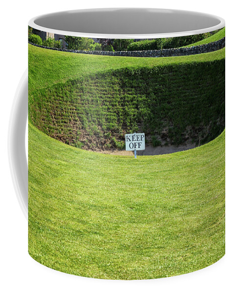 Almost Coffee Mug featuring the photograph A very steep bunker by Patricia Hofmeester