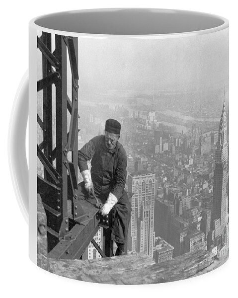 Lewis Wickes Hine Coffee Mug featuring the painting A worker bolts beams during construction by Celestial Images