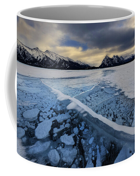 Abraham Lake Coffee Mug featuring the photograph Abraham Lake Ice Bubbles by Dan Jurak