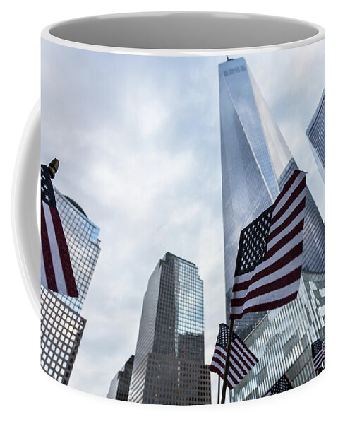 America Coffee Mug featuring the photograph American flag in front of the One World World trade Center by Didier Marti