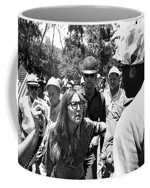 Anti Viet Nam War Protestor Confronting Marine Tucson Arizona 1970 Coffee Mug featuring the photograph Anti Viet Nam War protestor confronting Marine Tucson Arizona 1970 by David Lee Guss