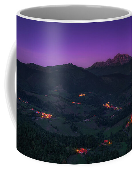 Mountain Coffee Mug featuring the photograph Aramaio valley at night by Mikel Martinez de Osaba