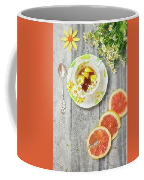 Tea Cup Coffee Mug featuring the photograph Art Deco Tea Cup with Grapefruit and Daisies by Susan Gary