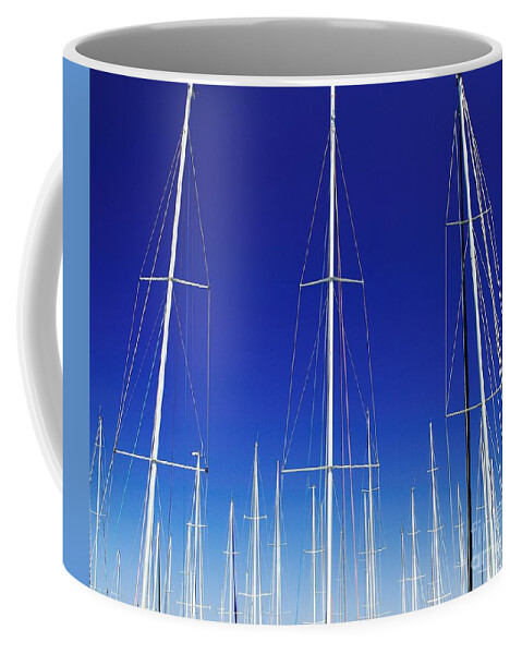 Australian Coffee Mug featuring the photograph Artistic. Yacht Masts Reaching into a Vivid Blue Sky. by Geoff Childs