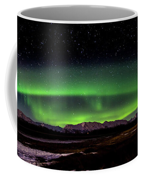 Aurora Borealis Coffee Mug featuring the photograph Aurora Spiral by Bryan Carter