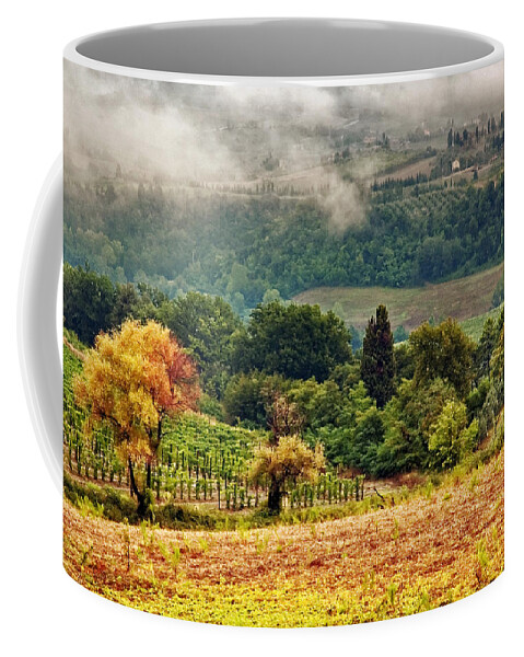 Fall Coffee Mug featuring the photograph Autumnal hills by Silvia Ganora