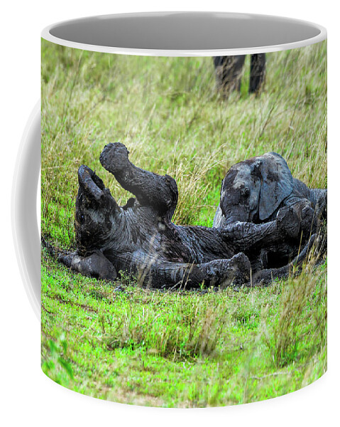 Africa Coffee Mug featuring the photograph Baby Elephants Playing in the Mud by Marilyn Burton