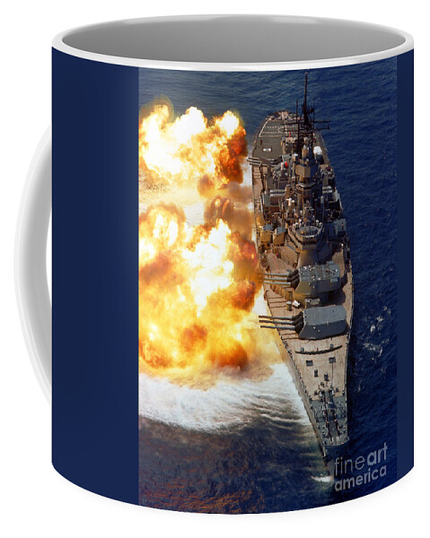 Vertical Coffee Mug featuring the photograph Battleship Uss Iowa Firing Its Mark 7 by Stocktrek Images