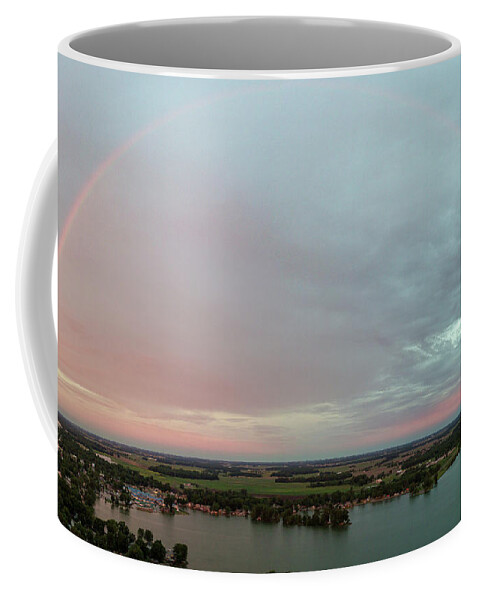  Coffee Mug featuring the photograph Behind the Surise by Brian Jones
