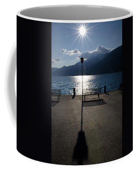 Bench Coffee Mug featuring the photograph Bench and street lamp by Mats Silvan