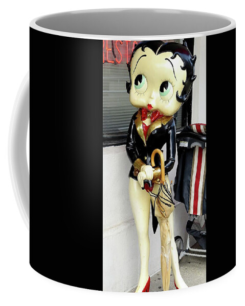 https://render.fineartamerica.com/images/rendered/default/frontright/mug/images/artworkimages/medium/1/betty-boop-with-umbrella-and-stroller-linda-stern.jpg?&targetx=310&targety=0&imagewidth=180&imageheight=333&modelwidth=800&modelheight=333&backgroundcolor=020203&orientation=0&producttype=coffeemug-11
