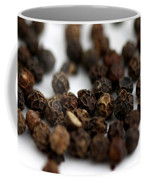 Black Coffee Mug featuring the photograph Black Pepper by Henrik Lehnerer