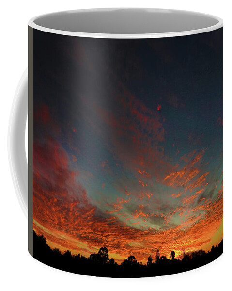 Sunset Coffee Mug featuring the photograph Blazing Sunset by Mark Blauhoefer