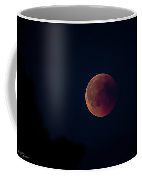 Blood Moon Coffee Mug featuring the photograph Blood Moon by Torbjorn Swenelius
