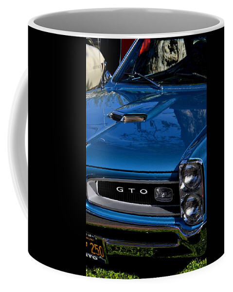  Coffee Mug featuring the photograph Blue GTO by Dean Ferreira