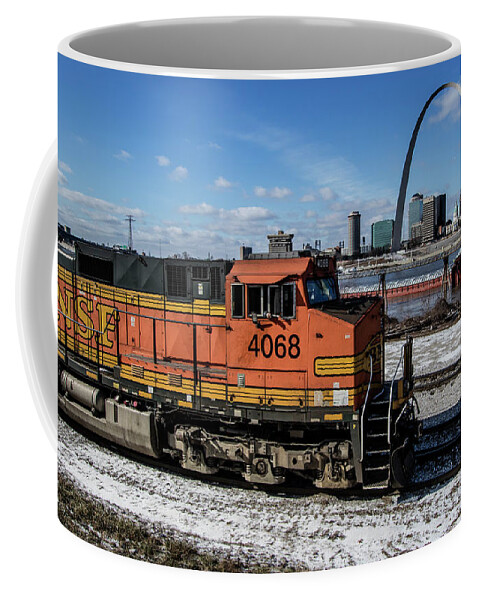 Mississippi River Coffee Mug featuring the photograph BNSF locomotive passing by the Arcj by Garry McMichael