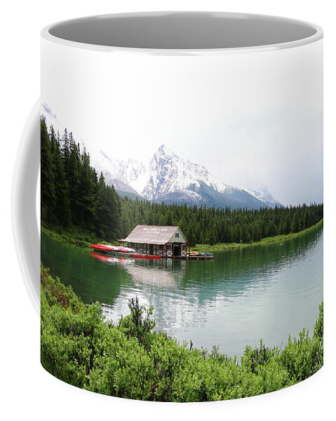 Canada Coffee Mug featuring the photograph Boat House On Maligne Lake by Christiane Schulze Art And Photography