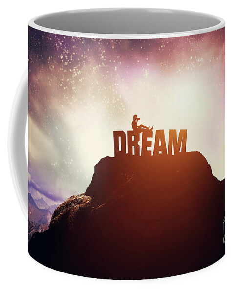 Dream Coffee Mug featuring the photograph Boy sitting on a DREAM writing on the peak of a mountain. by Michal Bednarek