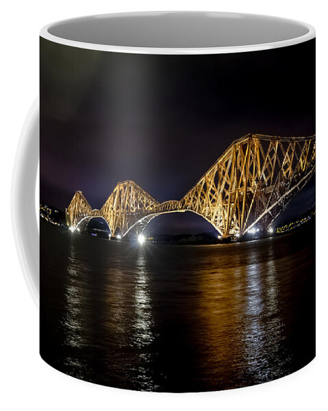 Water Coffee Mug featuring the photograph Bridge over water lights. by Elena Perelman