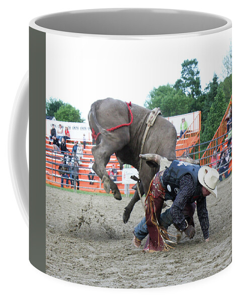Bull Riding Coffee Mug featuring the photograph Bull riding action by Nick Mares