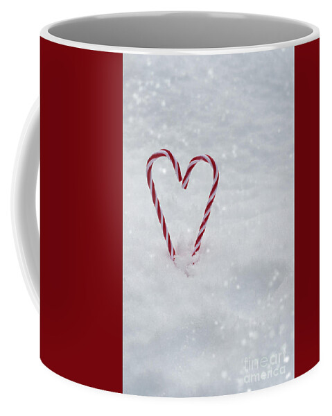Candy Coffee Mug featuring the photograph Candy Canes In Snow by Amanda Elwell