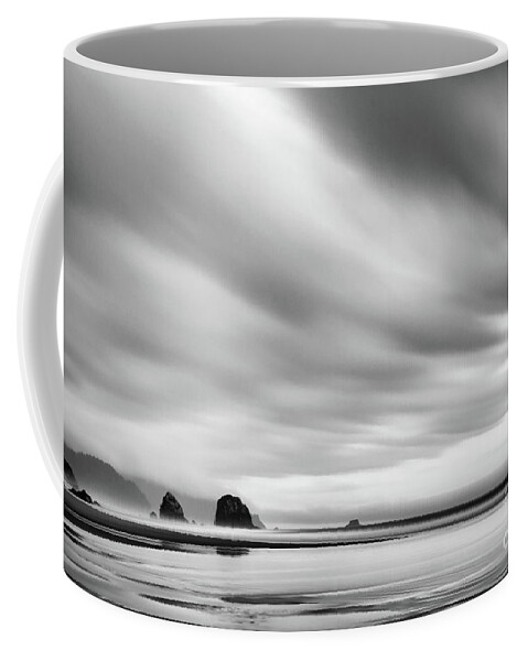 Haystack Rock Coffee Mug featuring the photograph Cannon Beach long exposure sunrise in black and white by Paul Quinn