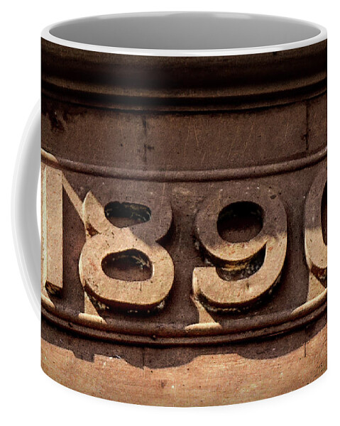 Bristol Coffee Mug featuring the photograph Carved Stone 1890 from Storefront by Denise Beverly