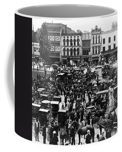 Kentucky Coffee Mug featuring the photograph Cheapside Public Square in Lexington - Kentucky - April 7 1920 by International Images