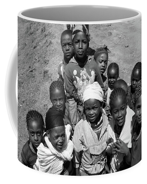 Ethiopia Coffee Mug featuring the photograph Children Of The Guge Mountain's, Ethiopia by Aidan Moran