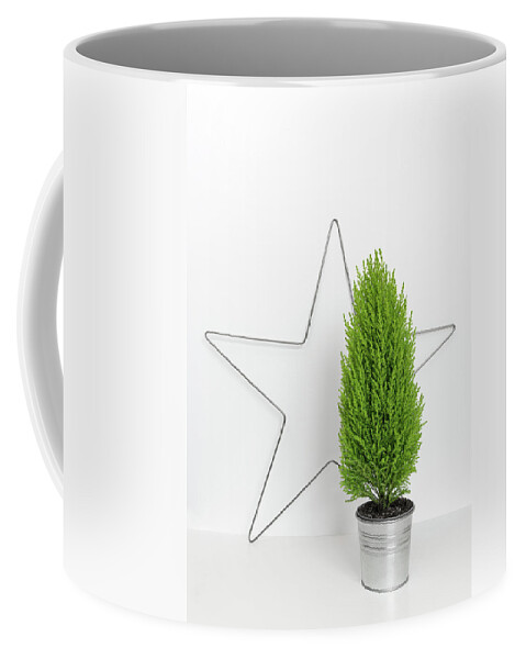 Design Coffee Mug featuring the photograph Christmas star and little green tree by GoodMood Art